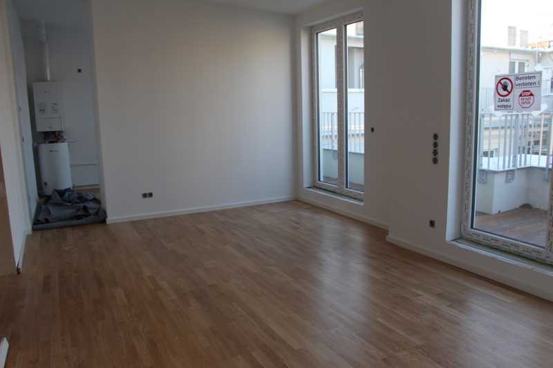 2-Zimmer-DG-Wohnung mit Terrasse als Kapitalanlage in Friedrichshain.