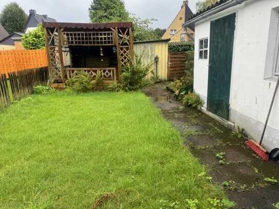 Für Handwerker...! Reihenmittelhaus mit Garten und Garage.