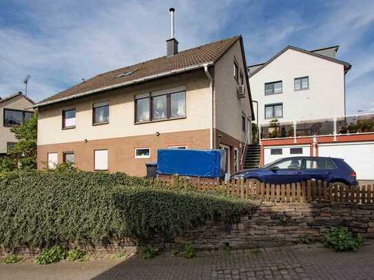 Freistehendes Einfamilienhaus mit Einliegerwohnung und Geschäftsfläche in Herdecke, Bach