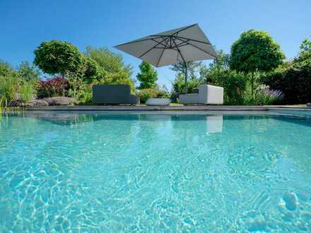 Designhaus mit traumhaftem Garten und Pool zu kaufen!