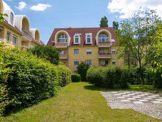 Sonnige und ruhige Wohnung mit Terrasse u. Gartenanteil inklusive Tiefgaragenstellplatz