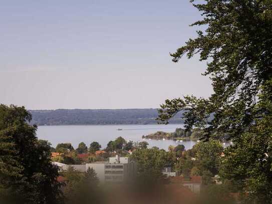 ENGEL&VÖLKERS: Projektierter Baugrund mit Seeblick und Bauvorbescheid