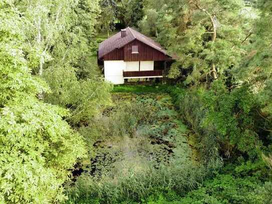 Landgut: Grundstück mit Ferienhaus und Agrargrundstück nahe der Stadt