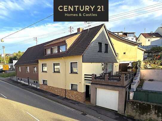 Attraktives 1 - 2 Familienhaus mit Balkon, Terrassen und Garage in Bildstock