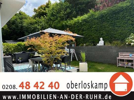 Neuwertige 3,5-Zimmer-EG-Wohnung mit Garten und großer SW- Terrasse und TG-SP in grüner Lage!