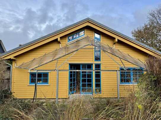 "Idyllisches Holzhaus im Naturpark Aukrug – Energieeffizient und naturnah"