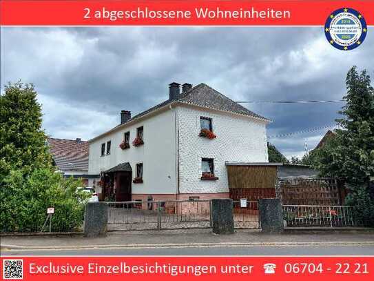 Zweifamilienhaus mit Hof, Garten und Doppelgarage