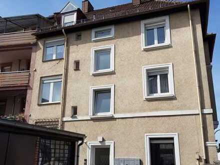 Schönes Mehrfamilienhaus mit Ladeneinheit - voll vermietet