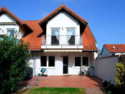 "Familienfreundliches Reihenmittelhaus mit Charme: Viel Raum, Gartenidylle und Homeoffice-Potenzial"