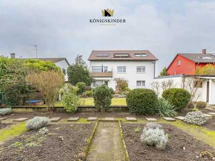 Karlsruhe: "Familienzusammenführung" 3-Familien-Haus in ruhiger Wohngegend mit 2 Garagen und Garten!