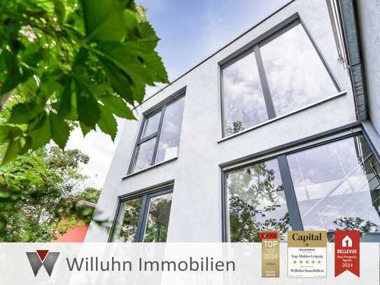 Stilvolles Architektenhaus am Wasser mit Dachterrasse und Garten