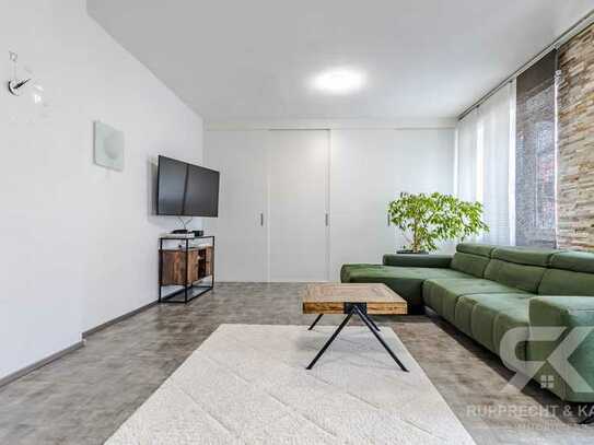 Renovierte und große 3-Zimmer-Eigentumswohnung mit neuem Bad, Garage und EBK in Innenstadtnähe