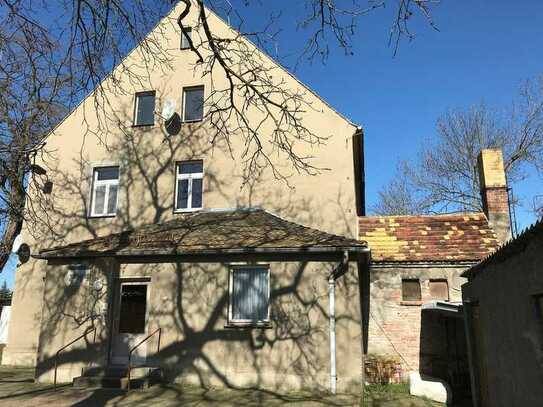 Denkmal geschütztes Mehrfamilienhaus mit Wasserzugang zum Muldearm