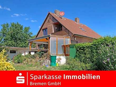 Bremen-Hemelingen: Attraktives Mehrfamilienhaus mit schönem Gartenbereich in ruhiger Wohnlage