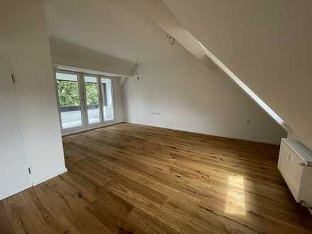 Renovierte 3-4 Zimmer Dachgeschoss Wohnung in Ortskern-Lage Grünwald