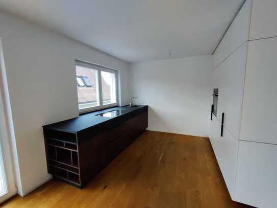 Exklusive, neuwertige 3,5-Zimmer-Wohnung mit luxuriöser Innenausstattung mit Einbauküche in Wollbach