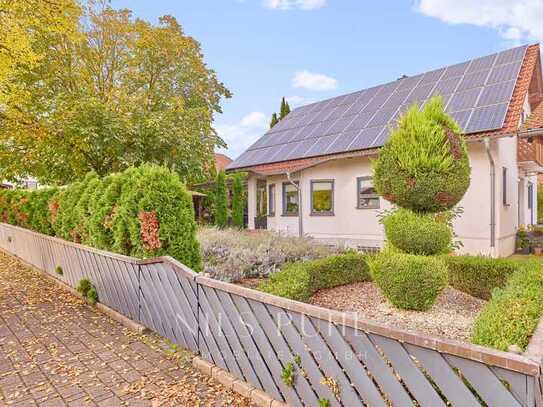 Nachhaltiges Einfamilienhaus mit Garten, Solaranlage und modernem Wohnkomfort auf drei Etagen