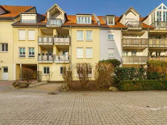 Attraktive Terrassenwohnung mit 3 Zimmern, Gartenanteil, TG-Stellplatz und EBK in ruhiger Lage