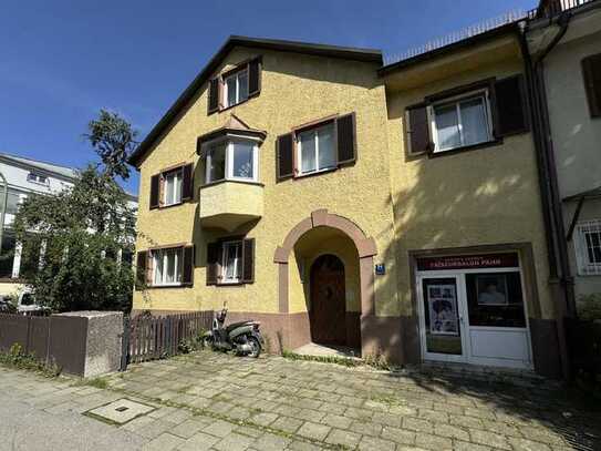 Historisches Mehrfamilienhaus mit fünf Wohneinheiten und einem Ladenlokal!