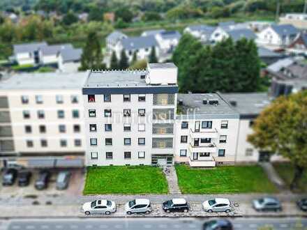 KAPITALANLEGER AUFGEPASST! Mehrfamilienhaus mit 16 Einheiten, Aufzug, 7 Garagen in DU-Vierlinden.
