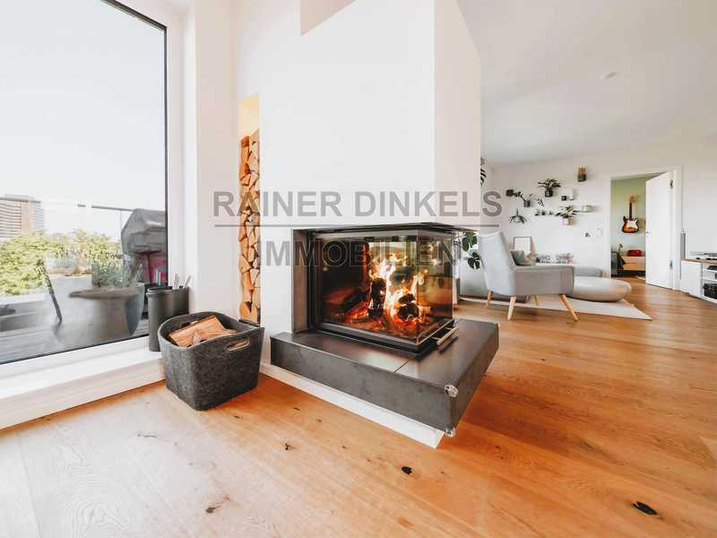 Exklusive Endetage über den Dächern – Design, Kamin & City Living!