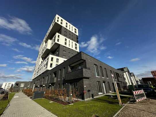 4 Zimmer mit Barrierefreiheit, 2 Bädern und Loggia in lebendigem Stadtquartier und grüner Umgebung