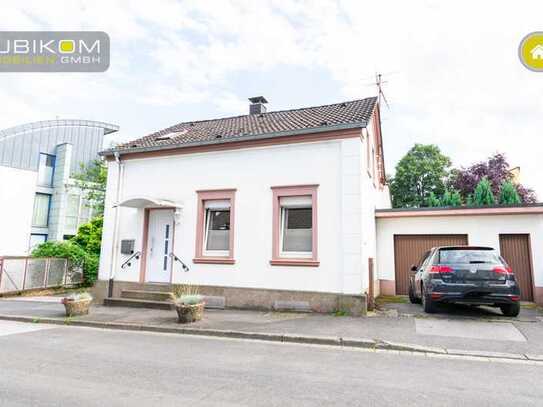 Solingen-Ohligs. Kleines freistehendes Einfamilienhaus mit Garten und Garage.