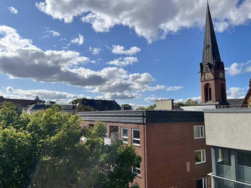 Traumhafte Endetage mit Balkon und 32 m² Dachgarten