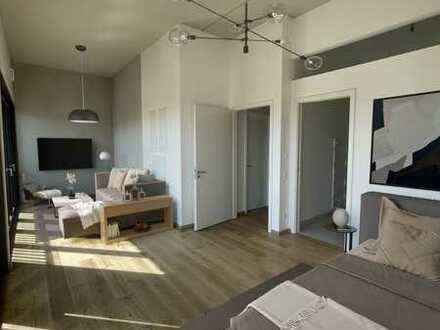 Hochwertige und moderne 2-Zi.-Loft-Wohnung mit High-End Küche in einzigartigem Neubau-Quartier!