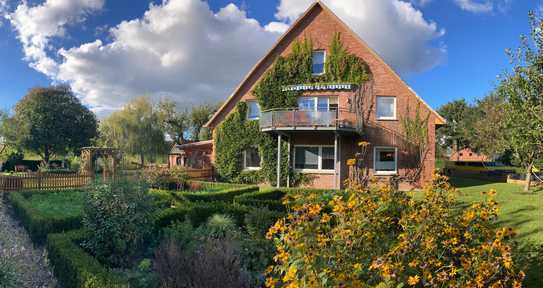 Charmantes Mehrfamilienhaus mit großzügigem Garten - Perfekt für Familien und Naturliebhaber