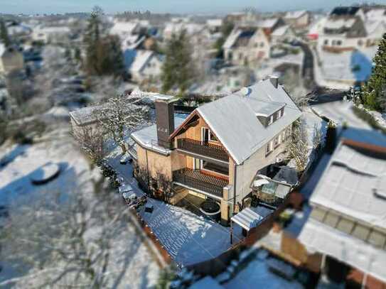 Traumhaftes Einfamilienhaus mit Einliegerwohnungsoption, idyllischem Garten und Weitblick