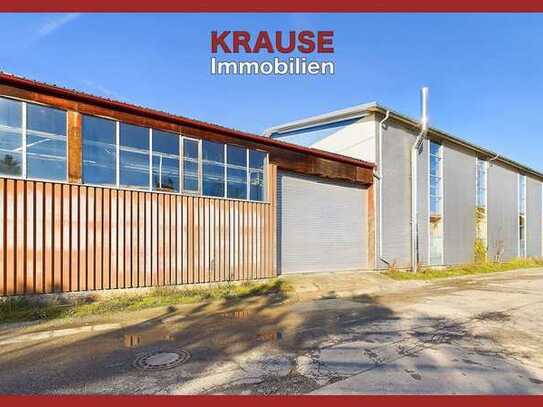 *Geschäftsgebäude mit Ausstellungsräumen, Lager, Büro, Wohnung und großer Halle*