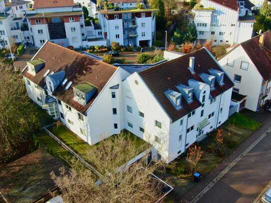 "Träumen, Wachsen, Wohlfühlen: Helle 3-Zimmer-Wohnung mit TG-Stellplatz, Terrasse & Gartenanteil“