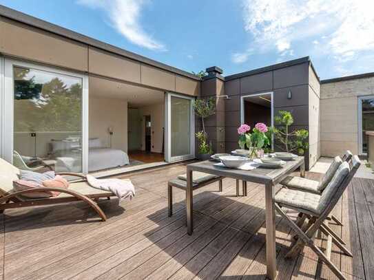 Penthouse-Highlight: Umlaufende Dachterrasse und 360°-Kamin