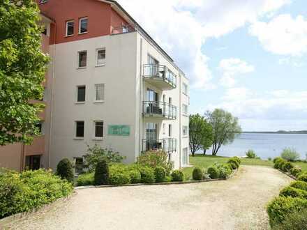 Ideale Kapitalanlage: Ferienwohnung mit Balkon, Liegewiese und direktem Zugang zum Plöner See