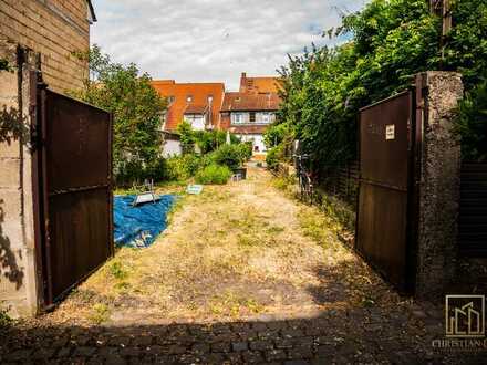 Christian Dik Immobilien / Baugrundstück mit 2-Familienhaus in der Innenstadt