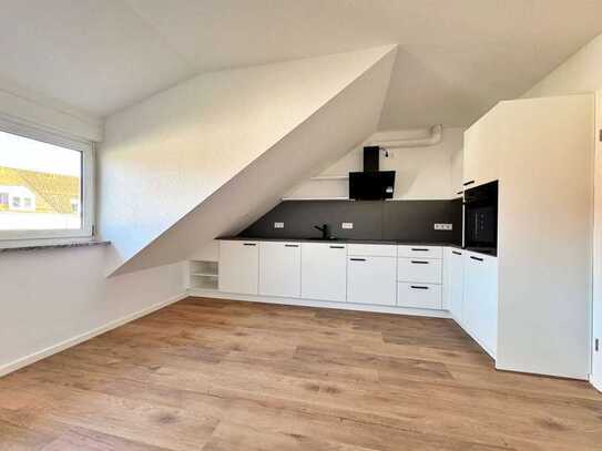 Modernisierte Dachgeschosswohnung, mit Balkon und Garage!