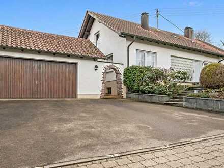 Einfamilienhaus mit Werkstattgebäude in idyllischer Wohnlage.