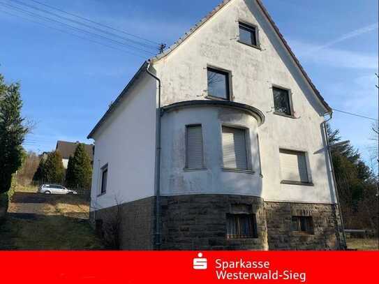 Solides Einfamilienhaus mit großzügigem Gartengrundstück sucht neuen Eigentümer