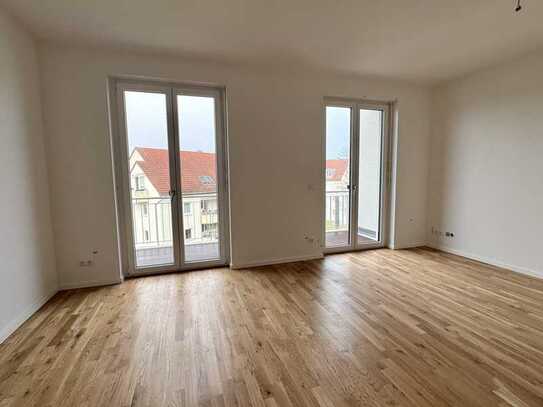 Erstbezug in ruhiger Lage: 2-Zimmer mit Balkon und EBK