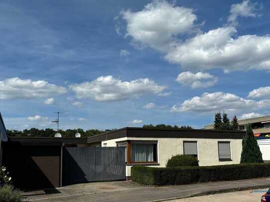 Interessanter Bungalow mit Einliegerwohnung und viel Platz