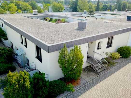 Winkel-Bungalow mit Einliegerwohnung in Neureut-Kirchfeld