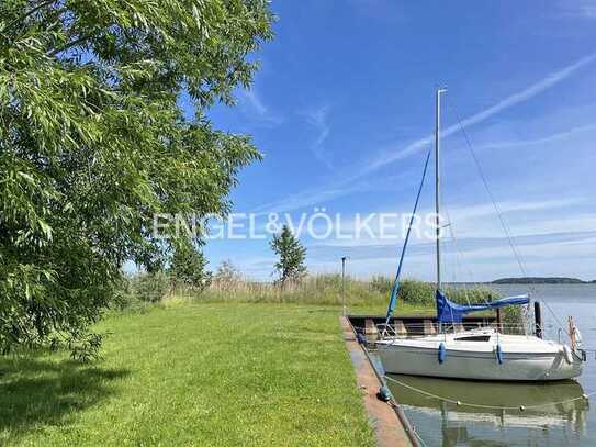 Wassergrundstück mit Baugenehmigung am Balmer Golfplatz