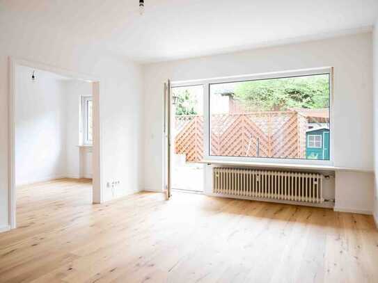 Helle 3 Zimmer EG-Wohnung mit Terrasse und kleinem Garten im Süden von München