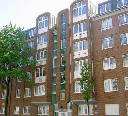 Sanierte Dachgeschosswohnung mit Balkon und einem Tiefgaragenstellplatz