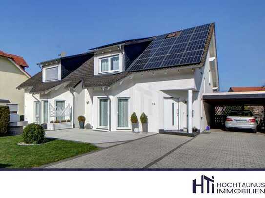 HTI | Inklusive PV-Anlage, Einliegerwohnung und Blick ins Grüne: Repräsentative Doppelhaushälfte in