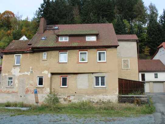 Sanierungsbedürftiges Mehrfamilienhaus mit 3 Wohneinheiten