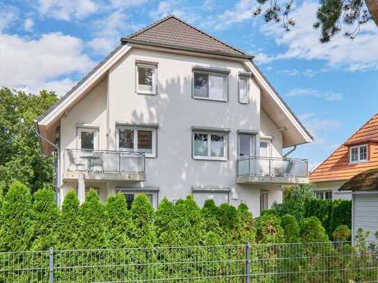 Scharbeutz - 2-Zimmer-Wohnung auf 2 Ebenen mit Balkon und Carportstellplatz