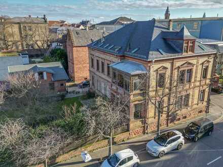 Jugendstil Wohn- und Geschäftshaus mit Baugrundstück in zentraler Lage