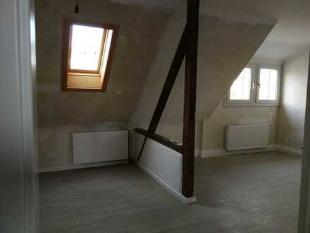 Gemütliche 2 Zimmer Dachgeschosswohnung, zentrumsnah (Garage optional möglich)
